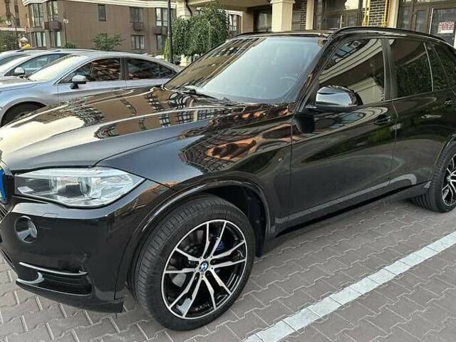 Черный БМВ Х5, объемом двигателя 2 л и пробегом 125 тыс. км за 22000 $, фото 4 на Automoto.ua