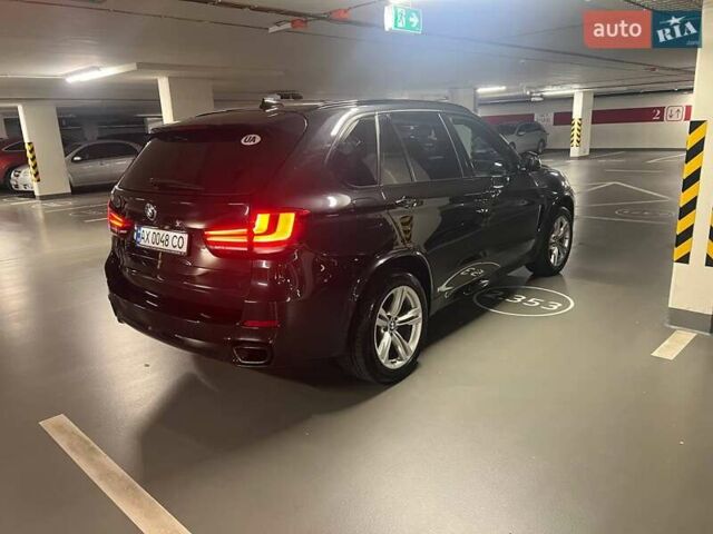 Черный БМВ Х5, объемом двигателя 2 л и пробегом 150 тыс. км за 28000 $, фото 5 на Automoto.ua