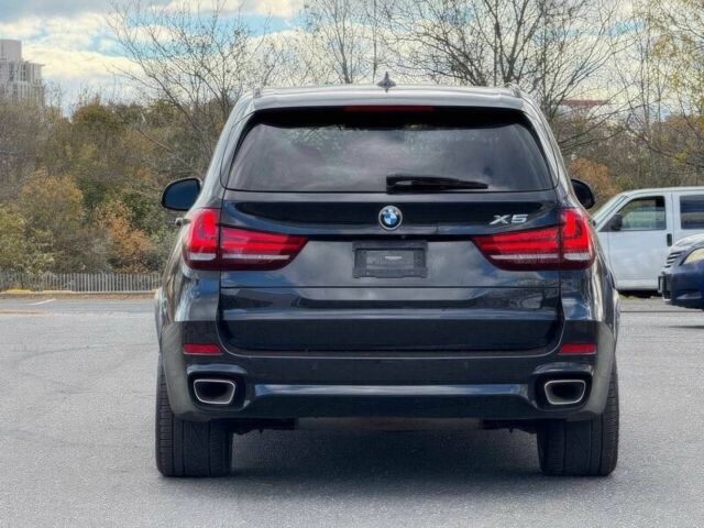Чорний БМВ Х5, об'ємом двигуна 3 л та пробігом 71 тис. км за 15000 $, фото 5 на Automoto.ua