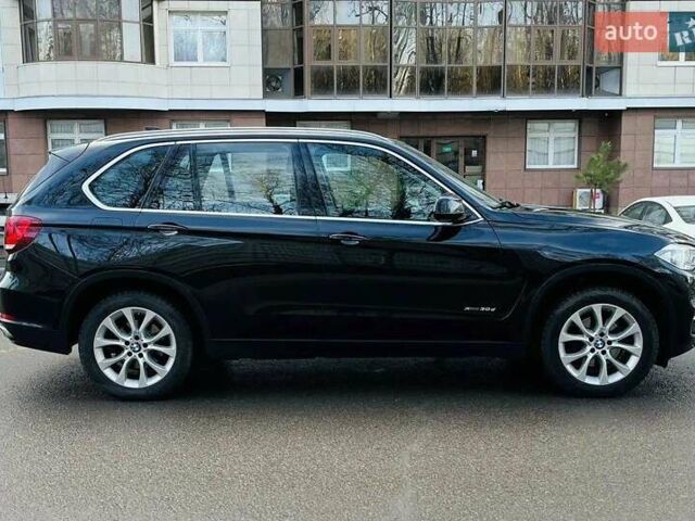 Черный БМВ Х5, объемом двигателя 3 л и пробегом 55 тыс. км за 28900 $, фото 4 на Automoto.ua