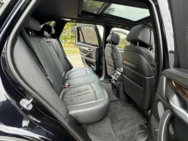 Черный БМВ Х5, объемом двигателя 4.4 л и пробегом 73 тыс. км за 18000 $, фото 10 на Automoto.ua