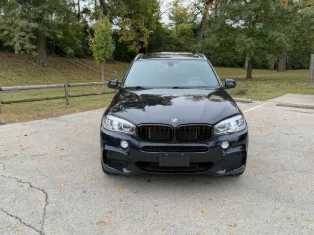 Черный БМВ Х5, объемом двигателя 4.4 л и пробегом 73 тыс. км за 18000 $, фото 1 на Automoto.ua