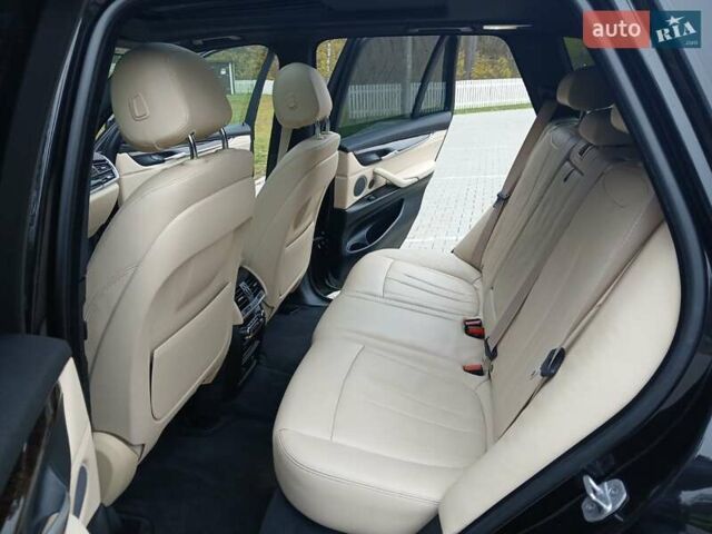 Черный БМВ Х5, объемом двигателя 2 л и пробегом 143 тыс. км за 29500 $, фото 21 на Automoto.ua