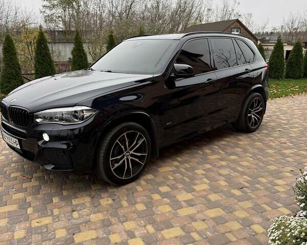 Черный БМВ Х5, объемом двигателя 3 л и пробегом 225 тыс. км за 36500 $, фото 1 на Automoto.ua