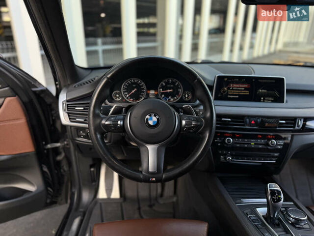 Черный БМВ Х5, объемом двигателя 3 л и пробегом 128 тыс. км за 36500 $, фото 24 на Automoto.ua