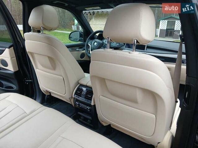 Черный БМВ Х5, объемом двигателя 2 л и пробегом 143 тыс. км за 29500 $, фото 22 на Automoto.ua