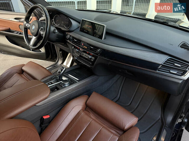 Черный БМВ Х5, объемом двигателя 3 л и пробегом 128 тыс. км за 36500 $, фото 16 на Automoto.ua