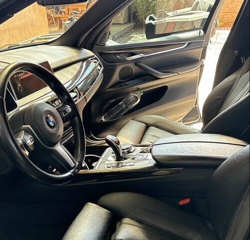 Черный БМВ Х5, объемом двигателя 3 л и пробегом 209 тыс. км за 29900 $, фото 4 на Automoto.ua