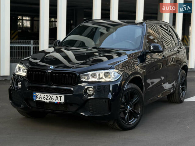 Черный БМВ Х5, объемом двигателя 3 л и пробегом 128 тыс. км за 36500 $, фото 1 на Automoto.ua