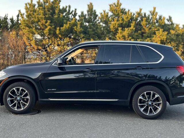 Черный БМВ Х5, объемом двигателя 3 л и пробегом 147 тыс. км за 17500 $, фото 1 на Automoto.ua