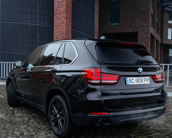 Черный БМВ Х5, объемом двигателя 2 л и пробегом 167 тыс. км за 23000 $, фото 2 на Automoto.ua