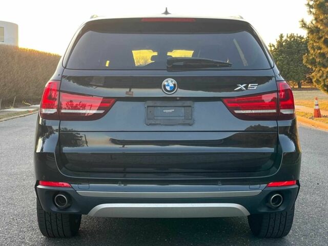 Черный БМВ Х5, объемом двигателя 3 л и пробегом 147 тыс. км за 17500 $, фото 2 на Automoto.ua