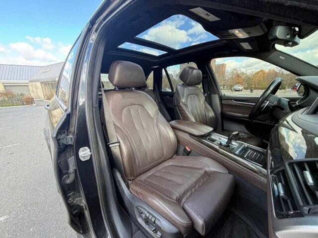 Чорний БМВ Х5, об'ємом двигуна 3 л та пробігом 71 тис. км за 15000 $, фото 10 на Automoto.ua