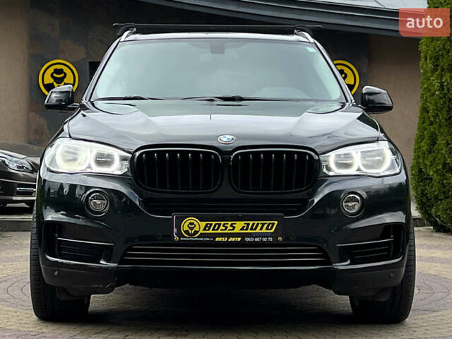 Черный БМВ Х5, объемом двигателя 2 л и пробегом 180 тыс. км за 26800 $, фото 1 на Automoto.ua