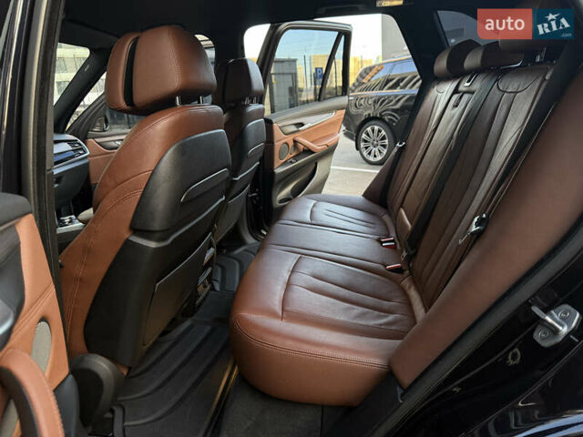 Черный БМВ Х5, объемом двигателя 3 л и пробегом 128 тыс. км за 36500 $, фото 14 на Automoto.ua