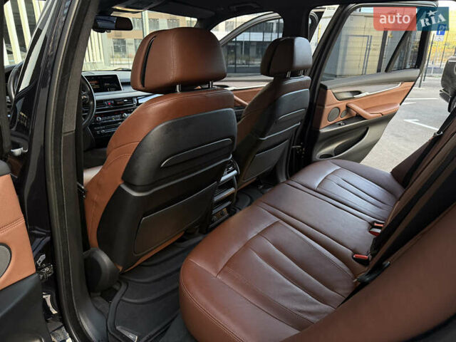 Черный БМВ Х5, объемом двигателя 3 л и пробегом 128 тыс. км за 36500 $, фото 13 на Automoto.ua