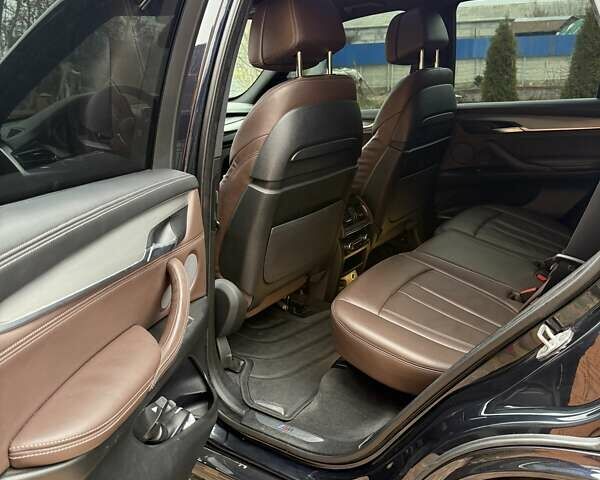 Черный БМВ Х5, объемом двигателя 3 л и пробегом 225 тыс. км за 36500 $, фото 7 на Automoto.ua