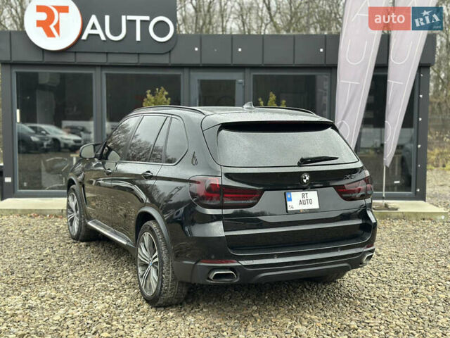 Чорний БМВ Х5, об'ємом двигуна 2 л та пробігом 189 тис. км за 24500 $, фото 2 на Automoto.ua
