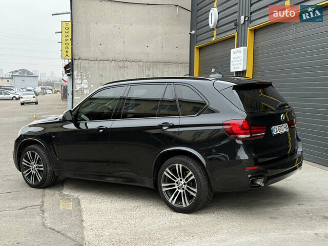 Чорний БМВ Х5, об'ємом двигуна 2 л та пробігом 214 тис. км за 29500 $, фото 2 на Automoto.ua