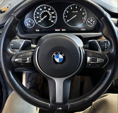 Черный БМВ Х5, объемом двигателя 3 л и пробегом 209 тыс. км за 29900 $, фото 1 на Automoto.ua