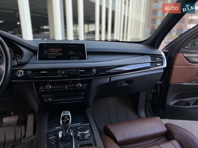 Черный БМВ Х5, объемом двигателя 3 л и пробегом 128 тыс. км за 36500 $, фото 23 на Automoto.ua