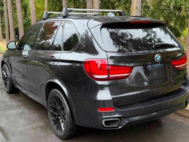 Черный БМВ Х5, объемом двигателя 3 л и пробегом 80 тыс. км за 13500 $, фото 4 на Automoto.ua
