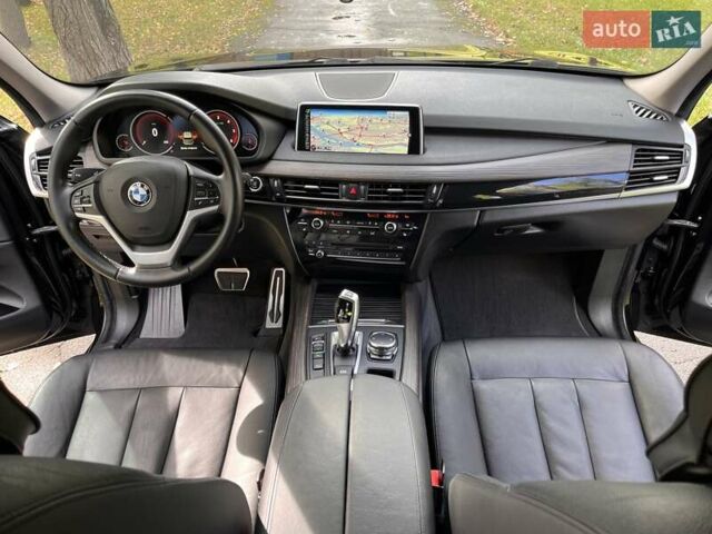 Чорний БМВ Х5, об'ємом двигуна 2 л та пробігом 202 тис. км за 23800 $, фото 1 на Automoto.ua