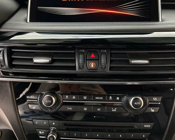 Черный БМВ Х5, объемом двигателя 3 л и пробегом 225 тыс. км за 38888 $, фото 24 на Automoto.ua