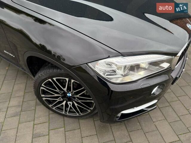 Черный БМВ Х5, объемом двигателя 2 л и пробегом 145 тыс. км за 32500 $, фото 1 на Automoto.ua