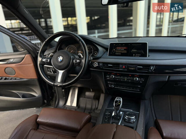 Черный БМВ Х5, объемом двигателя 3 л и пробегом 128 тыс. км за 36500 $, фото 22 на Automoto.ua