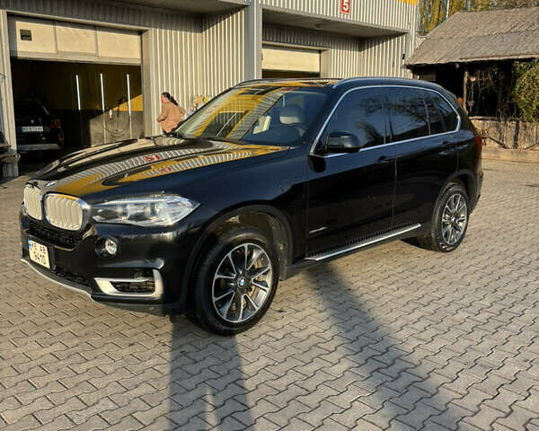 Черный БМВ Х5, объемом двигателя 2 л и пробегом 258 тыс. км за 25500 $, фото 1 на Automoto.ua