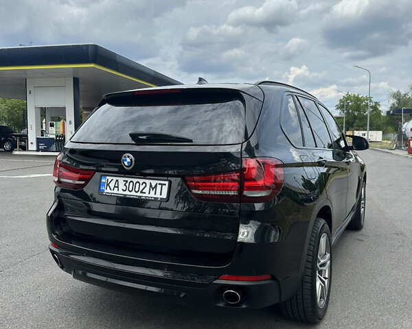 Черный БМВ Х5, объемом двигателя 2 л и пробегом 190 тыс. км за 29000 $, фото 4 на Automoto.ua