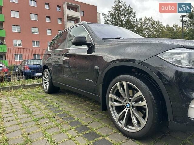 Черный БМВ Х5, объемом двигателя 2 л и пробегом 150 тыс. км за 28059 $, фото 35 на Automoto.ua