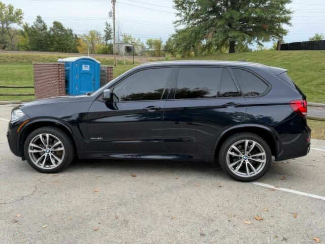 Черный БМВ Х5, объемом двигателя 4.4 л и пробегом 73 тыс. км за 18000 $, фото 4 на Automoto.ua