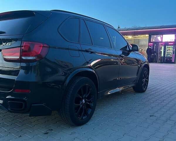 Черный БМВ Х5, объемом двигателя 3 л и пробегом 114 тыс. км за 32000 $, фото 4 на Automoto.ua