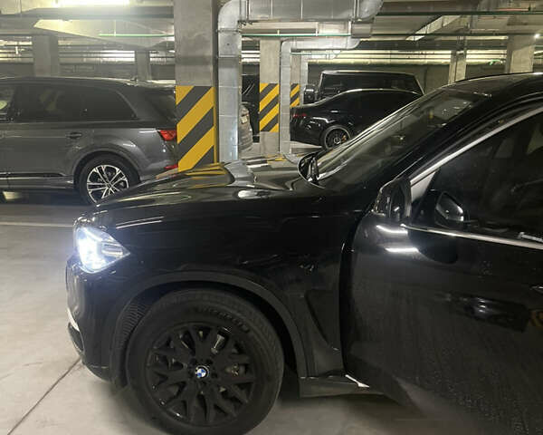 Чорний БМВ Х5, об'ємом двигуна 2 л та пробігом 118 тис. км за 29500 $, фото 2 на Automoto.ua