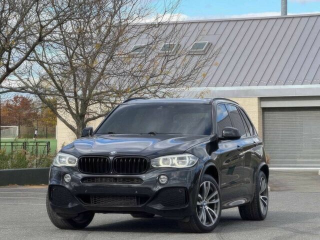 Чорний БМВ Х5, об'ємом двигуна 3 л та пробігом 71 тис. км за 15000 $, фото 2 на Automoto.ua