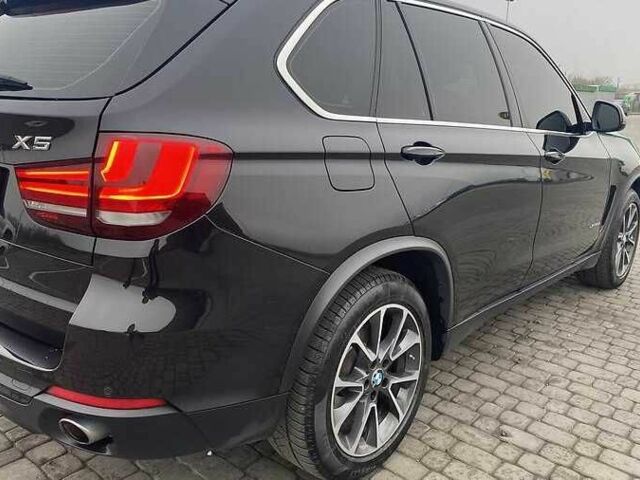 Черный БМВ Х5, объемом двигателя 2 л и пробегом 86 тыс. км за 20000 $, фото 4 на Automoto.ua