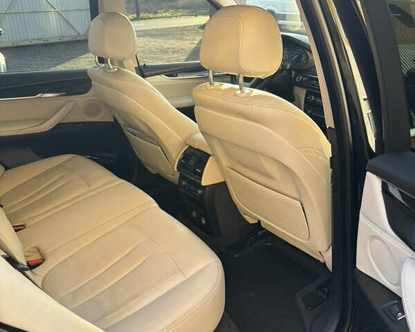 Черный БМВ Х5, объемом двигателя 2 л и пробегом 258 тыс. км за 25500 $, фото 15 на Automoto.ua