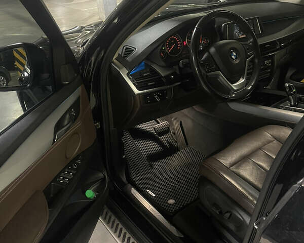Чорний БМВ Х5, об'ємом двигуна 2 л та пробігом 118 тис. км за 29500 $, фото 1 на Automoto.ua