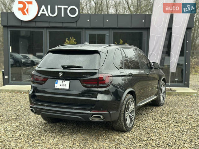 Чорний БМВ Х5, об'ємом двигуна 2 л та пробігом 189 тис. км за 24500 $, фото 6 на Automoto.ua