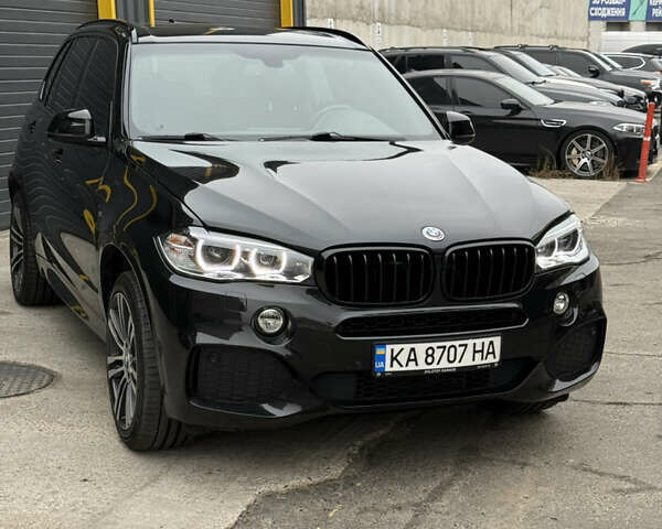 Чорний БМВ Х5, об'ємом двигуна 2 л та пробігом 214 тис. км за 29500 $, фото 1 на Automoto.ua