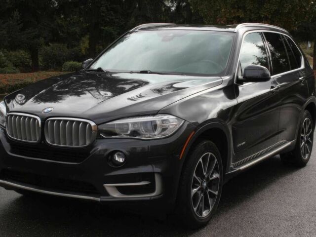 Черный БМВ Х5, объемом двигателя 3 л и пробегом 71 тыс. км за 6200 $, фото 2 на Automoto.ua
