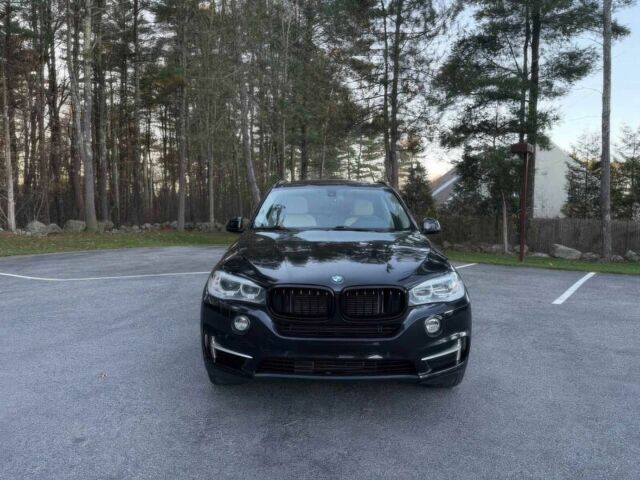 Черный БМВ Х5, объемом двигателя 3 л и пробегом 75 тыс. км за 11900 $, фото 1 на Automoto.ua