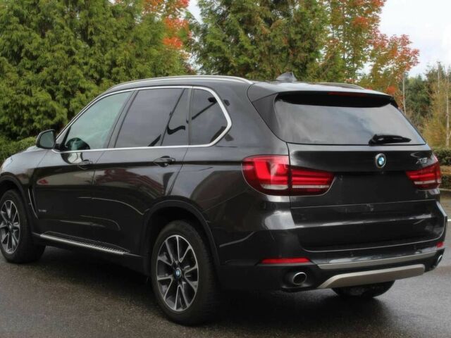 Черный БМВ Х5, объемом двигателя 3 л и пробегом 71 тыс. км за 6200 $, фото 4 на Automoto.ua