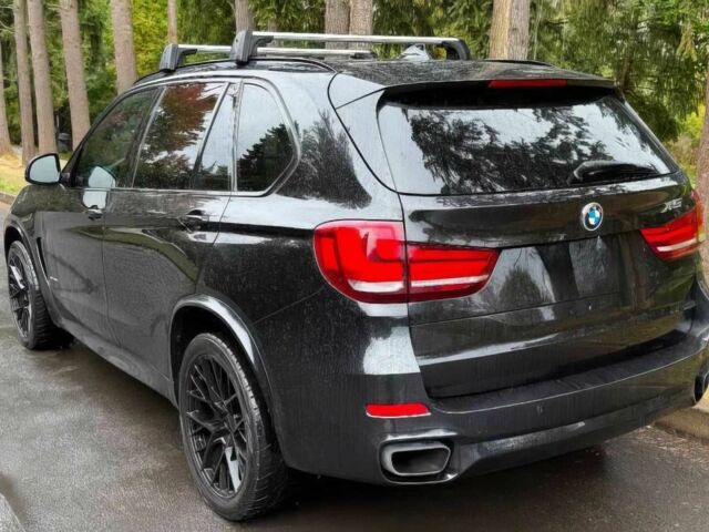 Черный БМВ Х5, объемом двигателя 3 л и пробегом 72 тыс. км за 12400 $, фото 4 на Automoto.ua