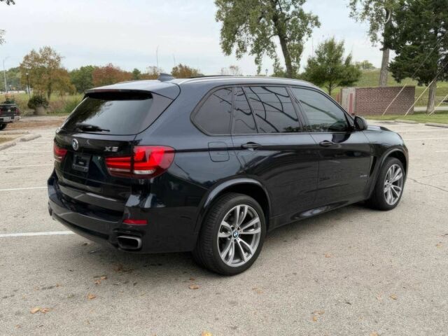 Черный БМВ Х5, объемом двигателя 4.4 л и пробегом 73 тыс. км за 18000 $, фото 5 на Automoto.ua
