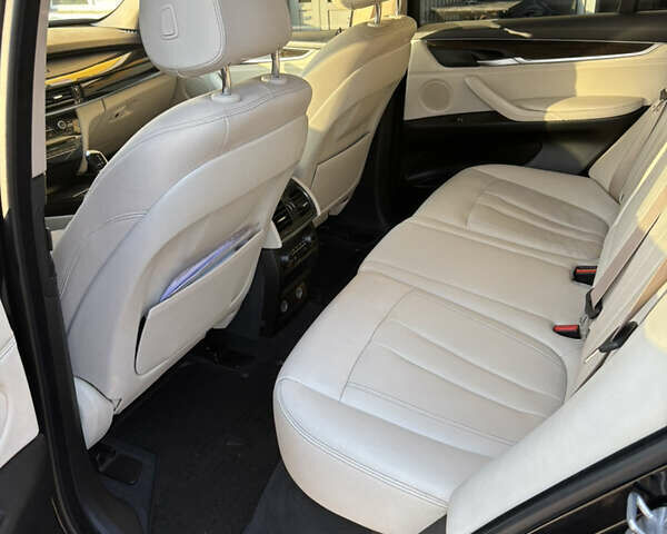 Черный БМВ Х5, объемом двигателя 2 л и пробегом 258 тыс. км за 25500 $, фото 5 на Automoto.ua