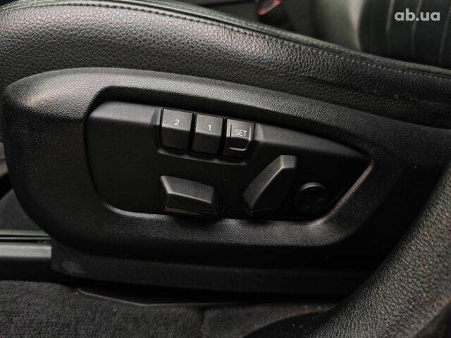 Чорний БМВ Х5, об'ємом двигуна 3 л та пробігом 298 тис. км за 19990 $, фото 25 на Automoto.ua