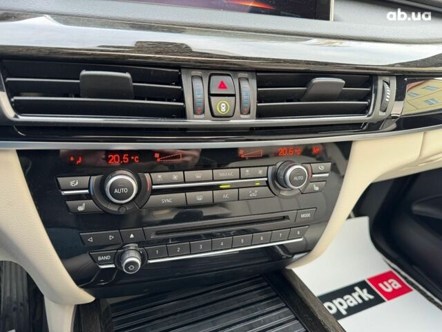 Чорний БМВ Х5, об'ємом двигуна 3 л та пробігом 110 тис. км за 28490 $, фото 28 на Automoto.ua